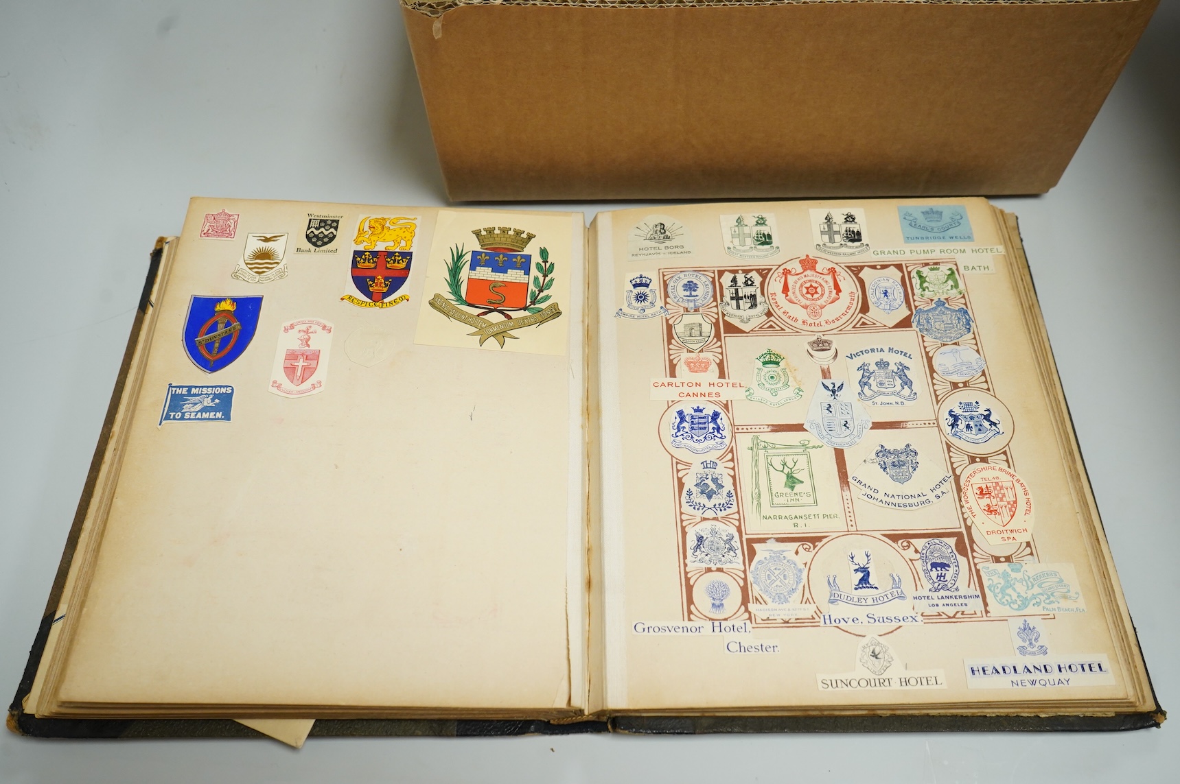 A collection of Victorian and later crest and monogram albums and loose crests and monograms